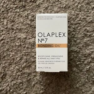 OLAPLEX No.7 Bonding Oil with White and Gold Packaging